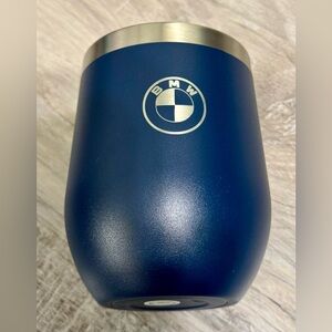 BMW travel coffee mug with a lid.